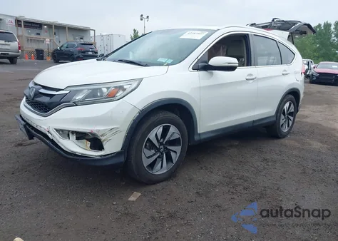 2016 Honda Cr-V Touring z USA, uszkodzony, nr VIN 5J6RM4H98GL140550